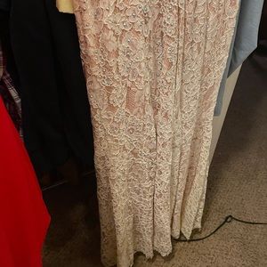 It is a peach underlay with white, and crystals on top.